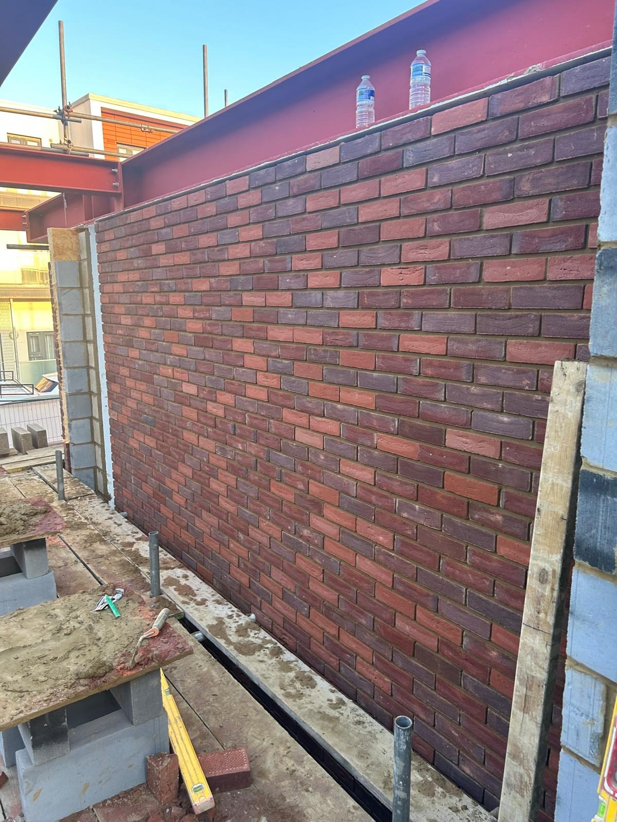 Close up of feature multi-tone brickwork on a commercial build