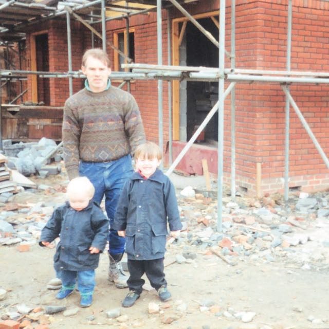 Founder on a building site in the early days of the company