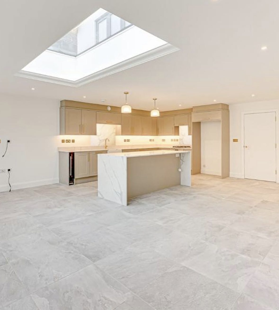 Kitchen extension with skylight and stone worktops
