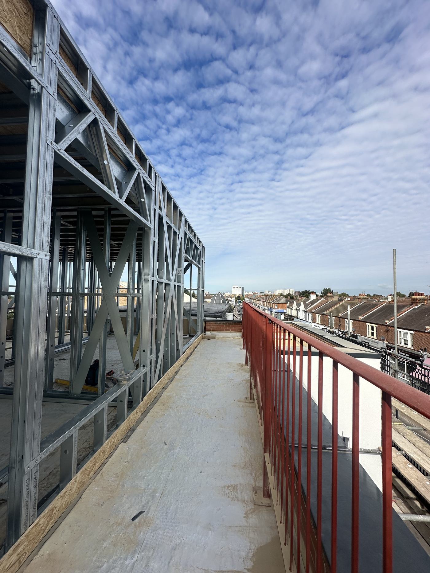 Elevated steel frame walkway on a commercial construction site